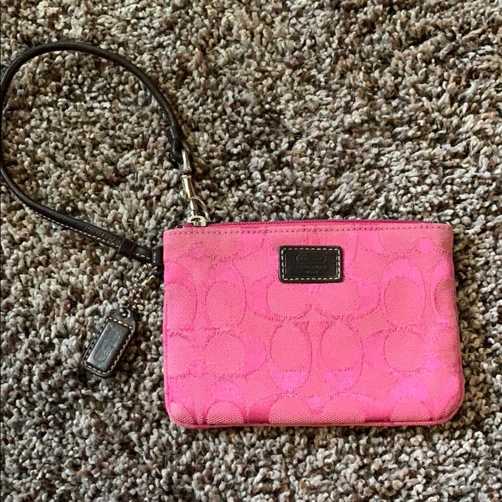 Pink Coach wristlet.